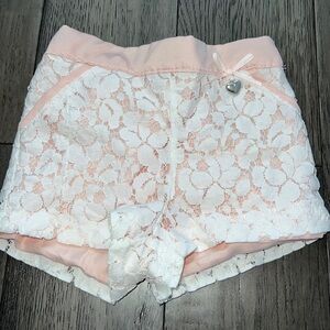 Baby girl lace shorts with satin like fabric